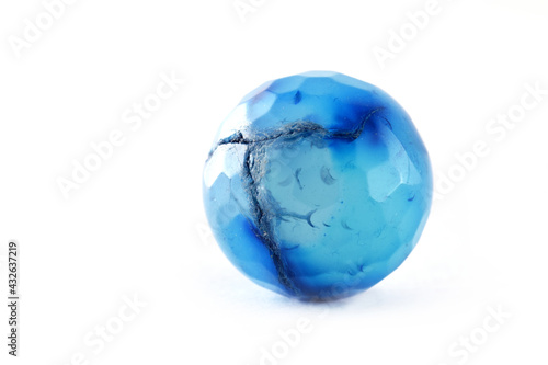 Patterned Blue agate beads isolated on white Round Agate beads Semi Precious stones. Natural mineral beads. Beads made of natural stones to create jewelry.