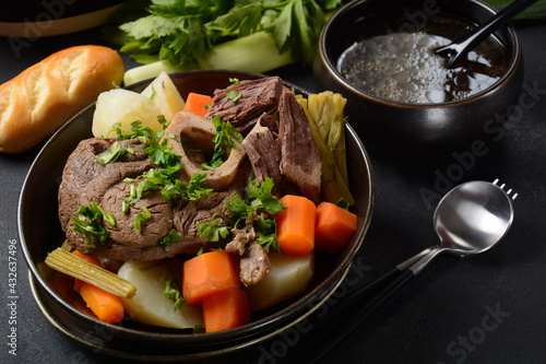 Pot-au-feu, traditional french stew. Stewed beef and potatoes. In France considered a national dish. photo