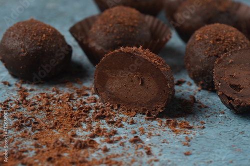 Foto Chocolate petit fours on a table