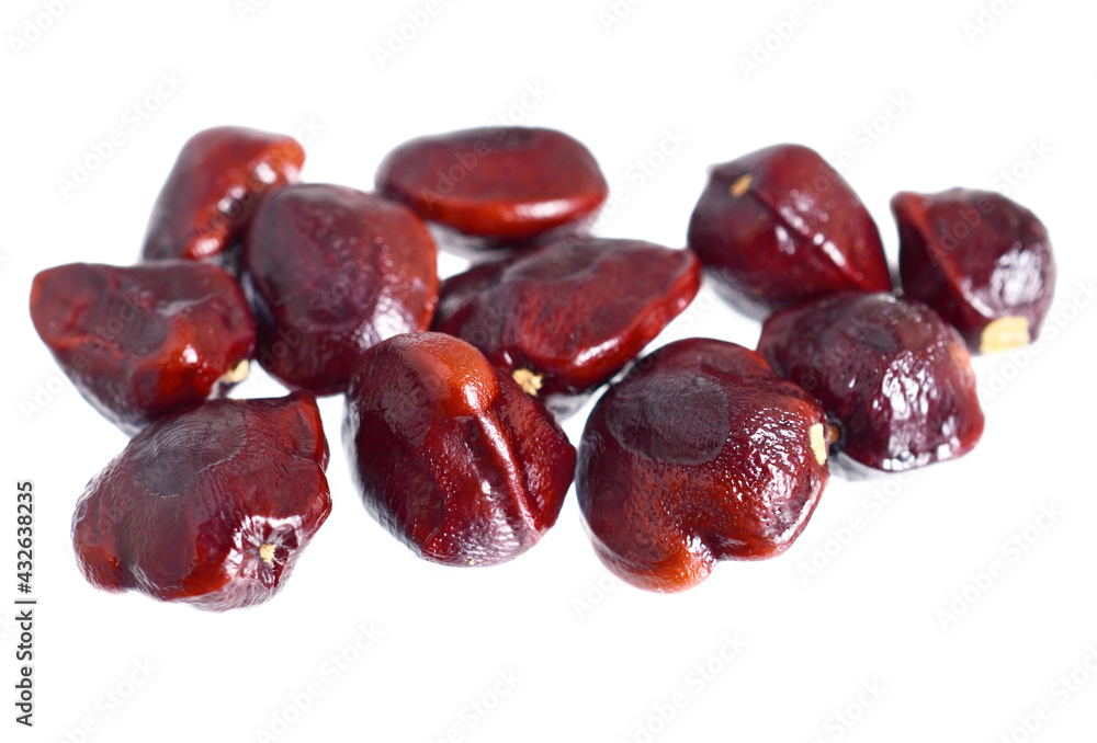 Tamarind (Tamarindus Indica) Stones (Seeds). Also known as Indian Dates. Isolated on White Tamarind (Tamarindus Indica) Stones (Seeds). Also known as Indian Dates. Isolated on White