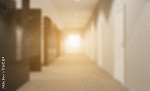 Bokeh blurred phototography.  Modern office building interior. 3D rendering.. Sunset.. Modern