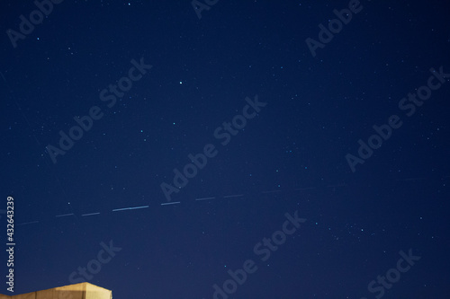 Starlink satellites passing by in the night sky