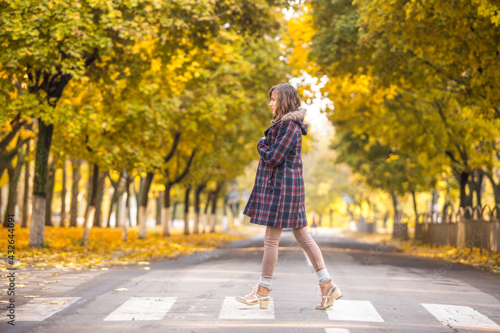 woman walking in the street
