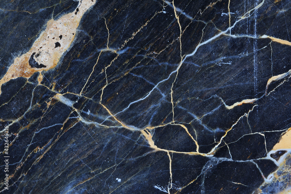 Gold, yellow and white patterned natural structure of dark gray blue marble texture background. Gold, yellow and white patterned natural structure of dark gray blue marble texture background.
