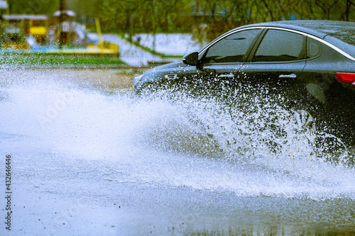 car rain puddle splashing water