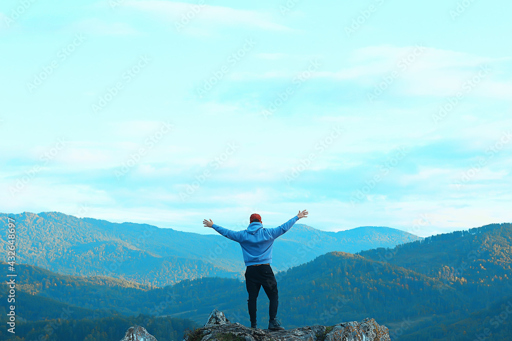 mountain man raised his hands, concept freedom victory active adventure mountain man raised his hands, concept freedom victory active adventure