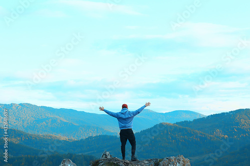 mountain man raised his hands, concept freedom victory active adventure