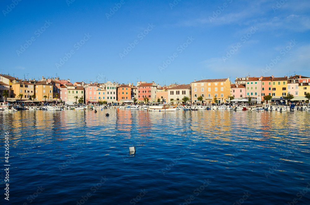 Romantic Old town of Rovinj, Istrian Peninsula, Adriatic sea, Croatia. Popular tourist destination. Old houses, harbour and marina with boats on the sea. Coastal town Rovigno. Istra. Waterfront