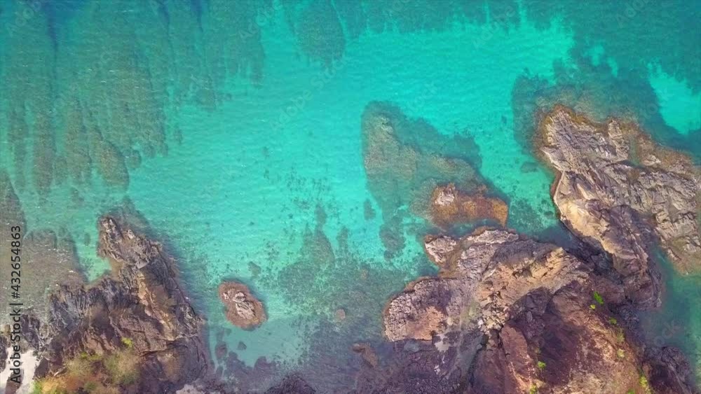 Aerial Shot Of Rock Formations At Beautiful Sea Shore - Nagsasa Cove, Philippines Aerial Shot Of Rock Formations At Beautiful Sea Shore - Nagsasa Cove, Philippines
