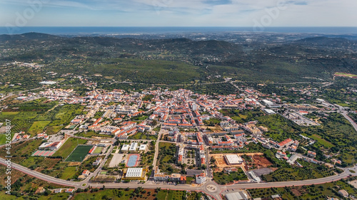 Aerial view from the sky of the Portuguese village of Sao Bras de Alportel, overlooking the Atlantic Sea. Portugal Algarve