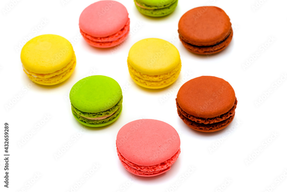 several multicolor macaron cakes on a white background several multicolor macaron cakes on a white background