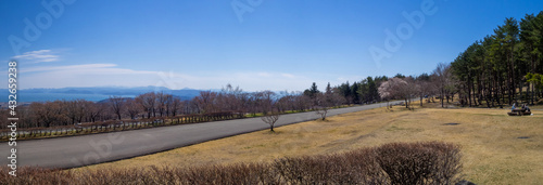 Overlooking an early spring forest and huge lake from a lookout in mountain (Inawashiro, Fukushima, Japan)