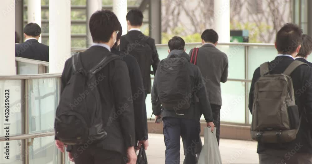 A slow motion of walking office workers at urban city in Shinagawa A slow motion of walking office workers at urban city in Shinagawa