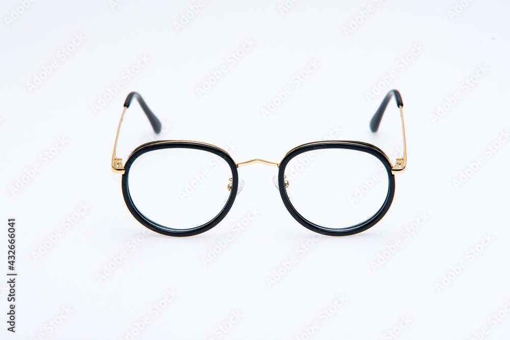 Fototapeta premium Side view. Fashion sunglasses black frames on white background.