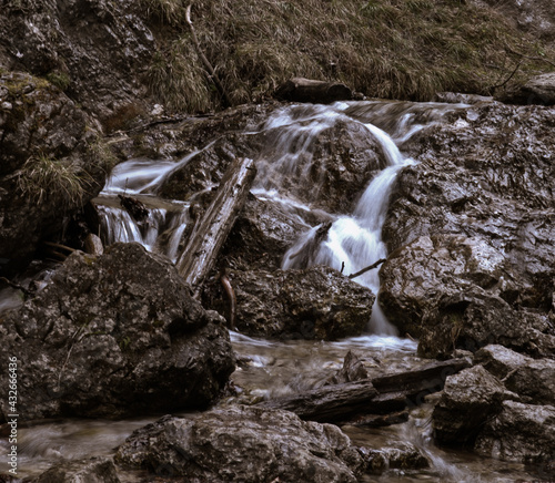 Water flowing over rocks in mountain Terchova