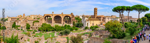 Panorama of Colosseum and Roman Forum  a forum surrounded by ruins in Rome  Italy