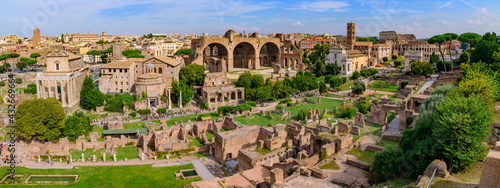 Fotografiet Panorama of Colosseum and Roman Forum, a forum surrounded by ruins in Rome, Ital