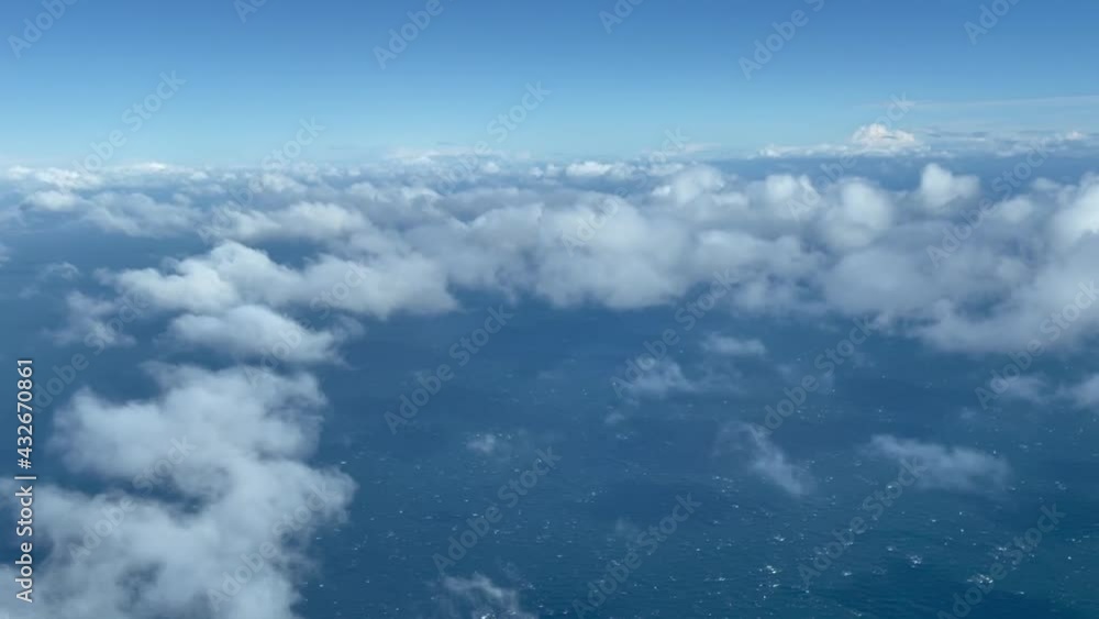 Flying over clouds on a bright day Flying over clouds on a bright day