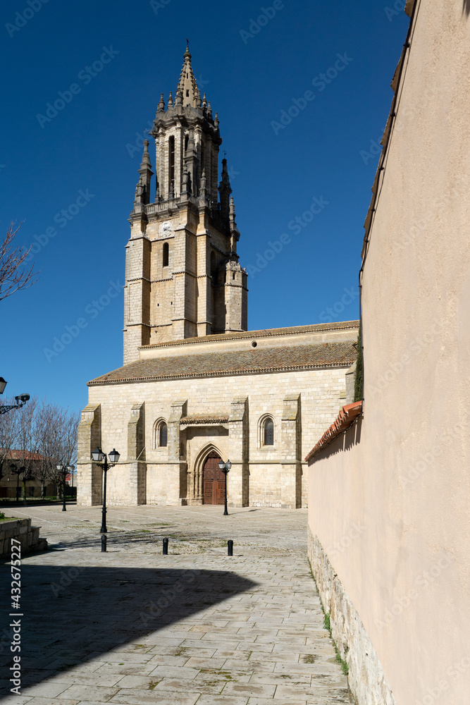 AMPUDIA, SPAIN - FEBRUARY 23, 2021: San Miguel church in Ampudia in a sunny day, Palencia, Castilla y León, Spain.