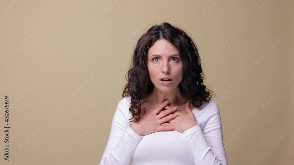 Brunette woman shake head denying failure or mistake. Nervous female gesturing in disagreement, saying no, disagree. Unhappy, stressed and shocked lady of 30s show denial. Isolated studio closeup shot Brunette woman shake head denying failure or mistake. Nervous female gesturing in disagreement, saying no, disagree. Unhappy, stressed and shocked lady of 30s show denial. Isolated studio closeup shot