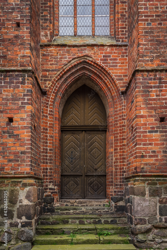 Gothic facade and door of St. Mary church. Hansestadt Stendal is a medieval town in Saxony-Anhalt state. Germany.
