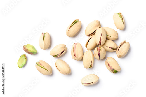 Flat lay of pistachio nuts on a white background. photo
