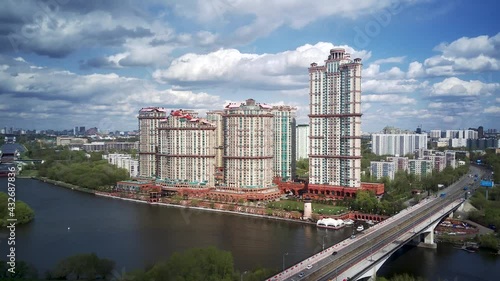 Amazing high angle top drone view on Strogino and Shchukino	district which are situated in beautiful green river park.
