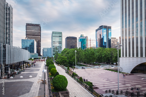 Wide-angle view of AZCA business and financial district in Madrid at dusk, Spain. Long exposure.