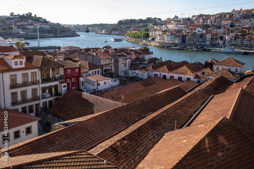 View of the roofs of the houses in Vila Nova de Gaia, the Douro River and Ribeiro, Porto, Portugal. photo