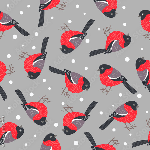 seamless pattern with bullfinches on a grey background