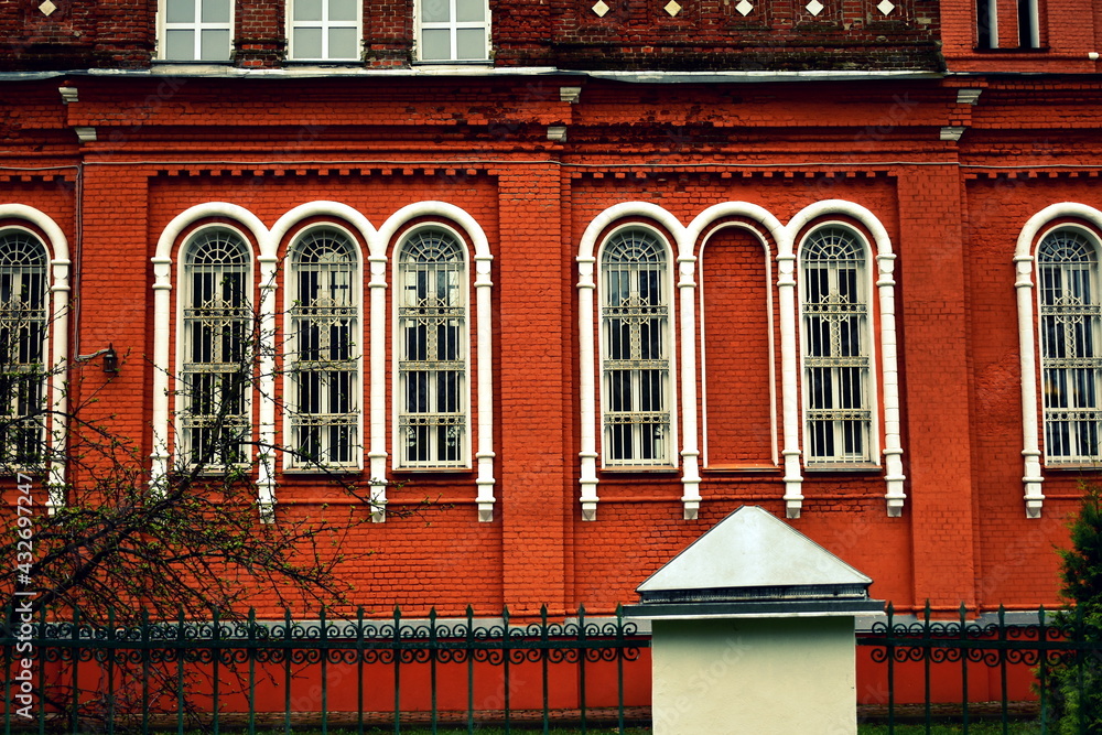 Fototapeta premium old church windows with metal crate
