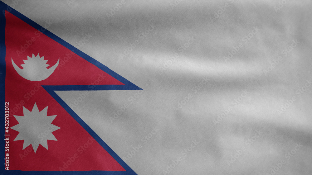Nepalese flag waving in the wind. Close up of Nepal banner blowing soft silk. Nepalese flag waving in the wind. Close up of Nepal banner blowing soft silk.
