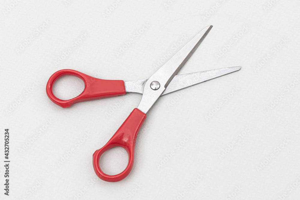 Red scissors isolated on white background. Red scissors isolated on white background.