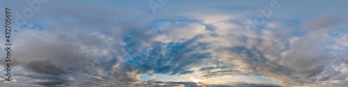 Fototapeta Naklejka Na Ścianę i Meble -  Overcast sky panorama on sunset with Cumulus clouds in Seamless spherical equirectangular format as full zenith for use in 3D graphics, game and aerial drone 360 degree panoramas for sky replacement.