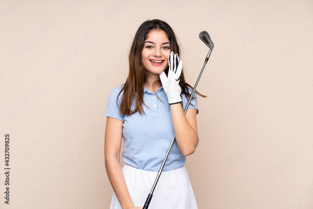Young caucasian woman isolated on beige background shouting with mouth wide open Young caucasian woman isolated on beige background shouting with mouth wide open
