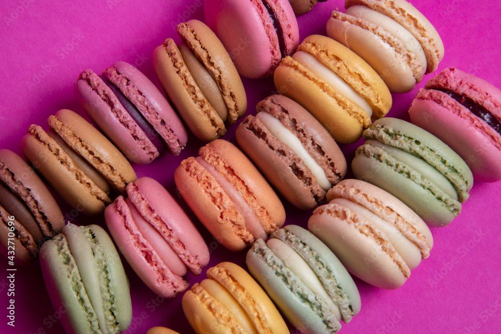 colorful macaroons on a pink background colorful macaroons on a pink background