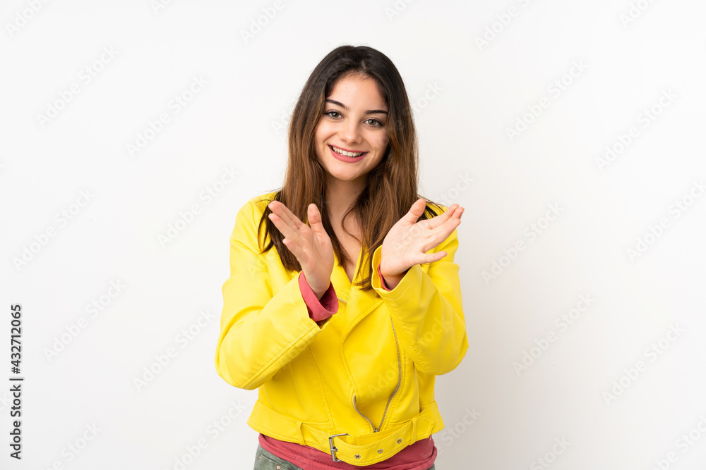 Young caucasian woman isolated on white background applauding after presentation in a conference Young caucasian woman isolated on white background applauding after presentation in a conference