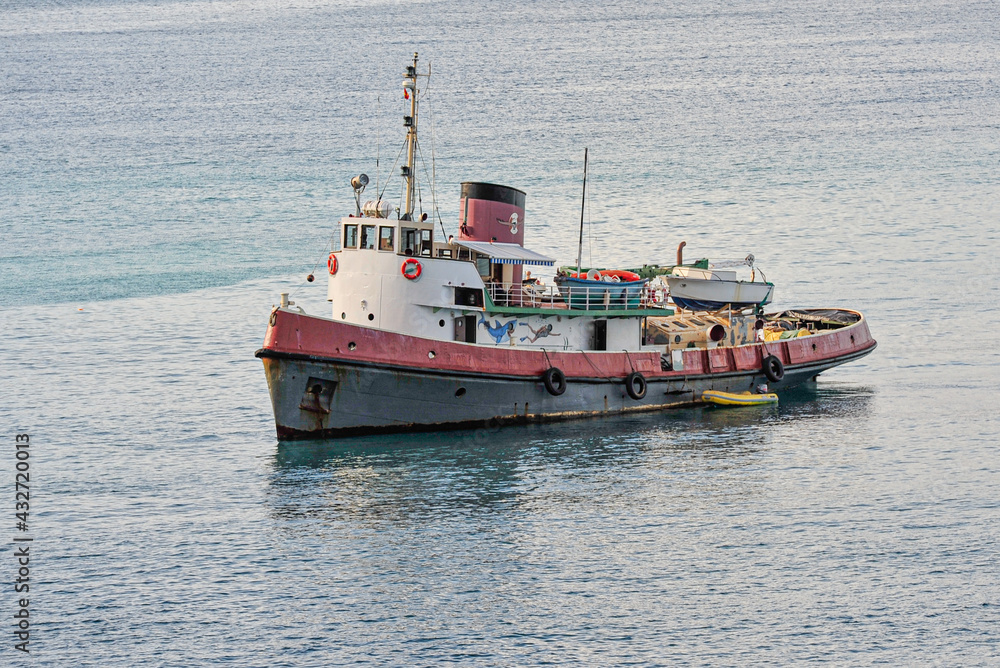 Fishing boat sailing in Grenada bay, Caribbean sea Fishing boat sailing in Grenada bay, Caribbean sea