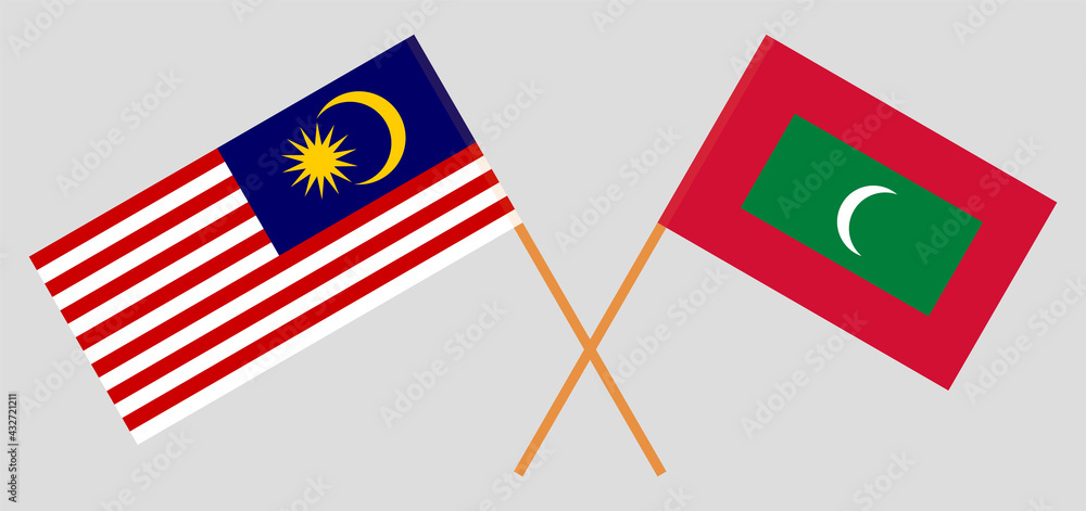 Crossed flags of Malaysia and Maldives. Official colors. Correct proportion Crossed flags of Malaysia and Maldives. Official colors. Correct proportion