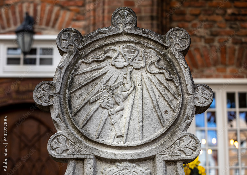 Stone relief decorating the entrances to houses at Mariacka Street in Gdańsk. Poland