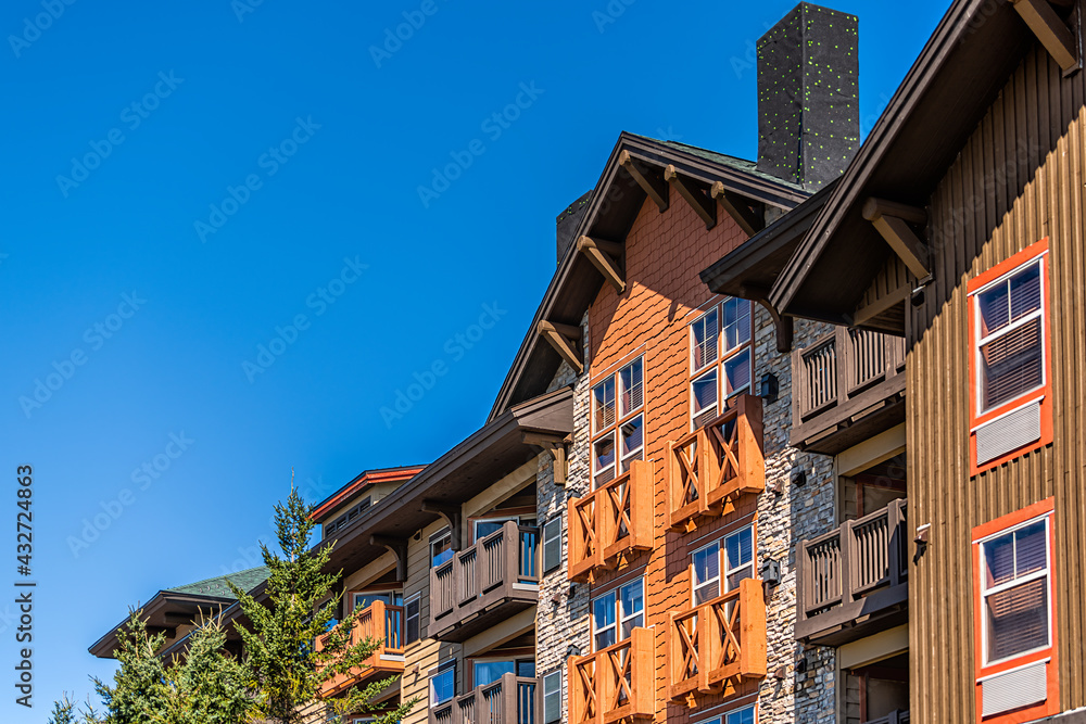 Apartment condo condominium building lodge in small ski resort town village of Snowshoe, West Virginia looking up low angle view