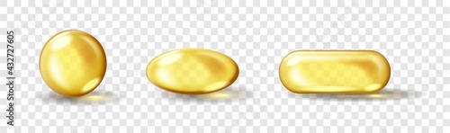 Set of oil golden capsules. Cosmetic pill capsule of vitamin E, A, almond oil, Omega 3, fish