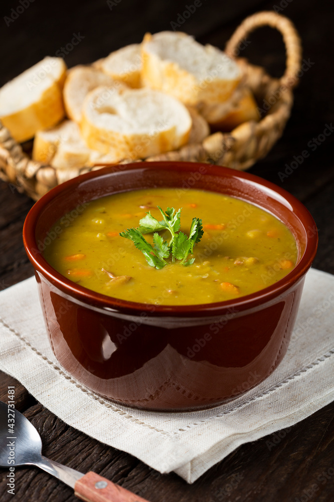 Pea soup. Bowl with pea soup on the table Pea soup. Bowl with pea soup on the table