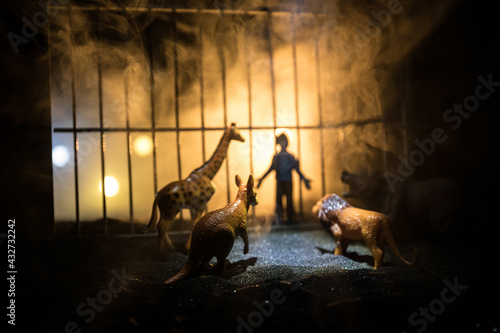 Photography People and animals on opposite sides of the fence concept