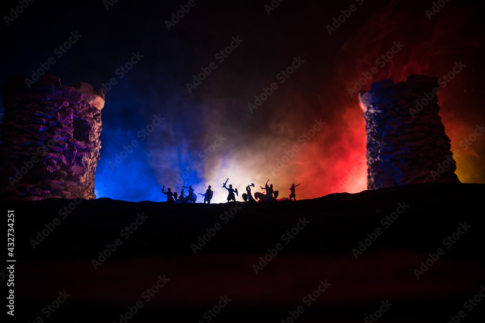 Medieval battle scene. Silhouettes of figures as separate objects, fight between warriors at night. Creative artwork decoration. Foggy background. Medieval battle scene. Silhouettes of figures as separate objects, fight between warriors at night. Creative artwork decoration. Foggy background.