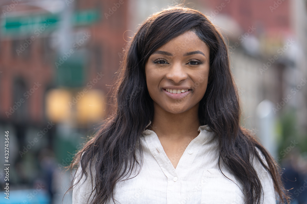 Young black woman in city smile happy face portrait Young black woman in city smile happy face portrait