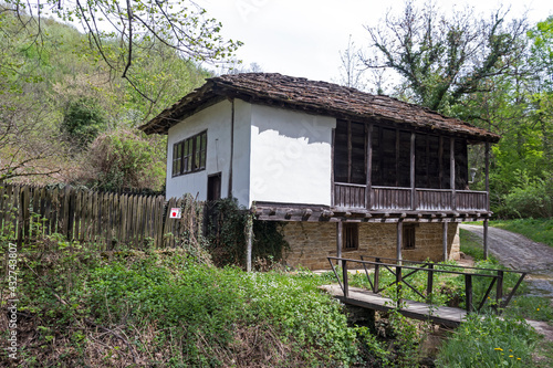 Typical street and old houses at historical village of Bozhentsi, Bulgaria