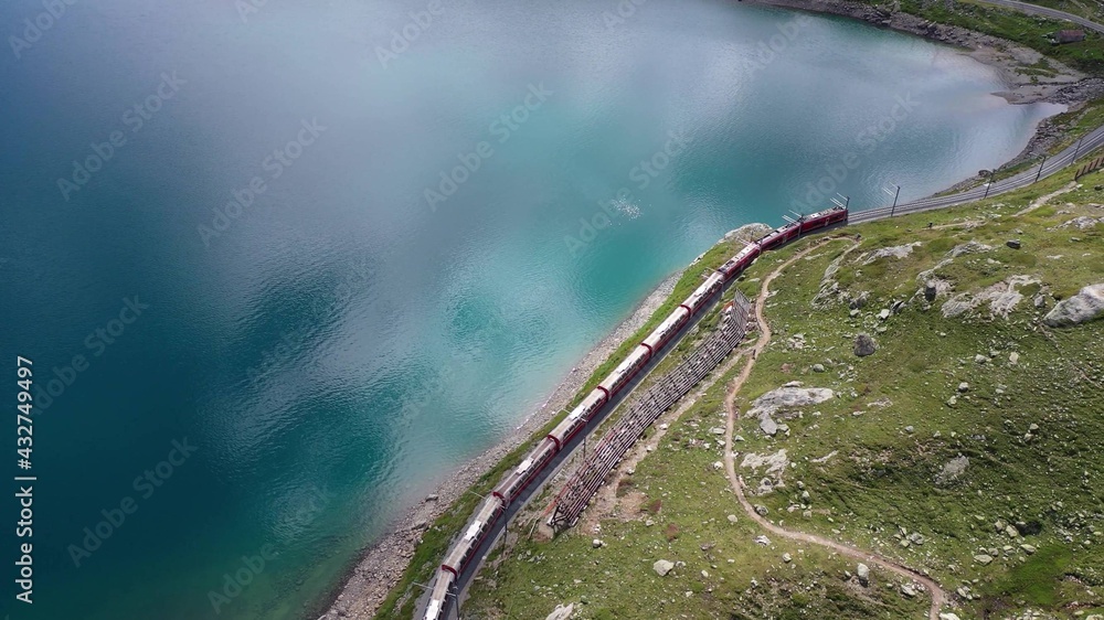 Glacier express, Lago Bianco. Train and lake.