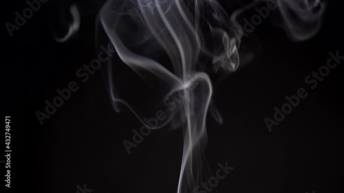 Movement of smoke on black background, smoke background, abstract smoke on black background
