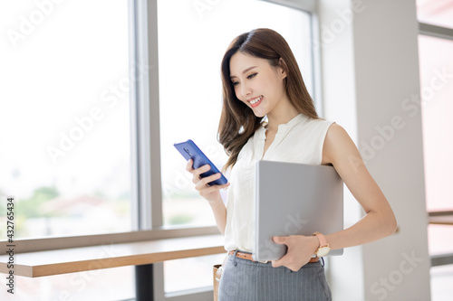 businesswoman use smart phone